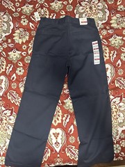 Children’s uniform set in khaki, size 8 Husky, and navy blue, size 10 Husky