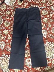 Children’s uniform set in khaki, size 8 Husky, and navy blue, size 10 Husky
